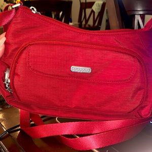 Women’s red crossbody purse.